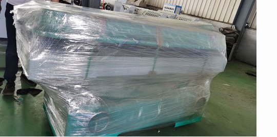 Machine wrapped in protective film